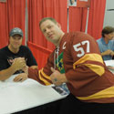 Firefly star Adam Baldwin snapping a shot with the Browncoats jersey!